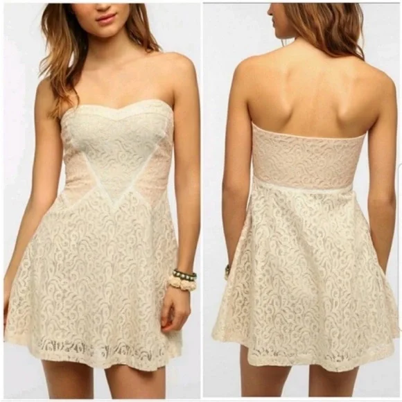 chinese dress ladies Urban Outfitters Cream Ruffled Mini Dress (Sz M)  The Thrifty Hippy